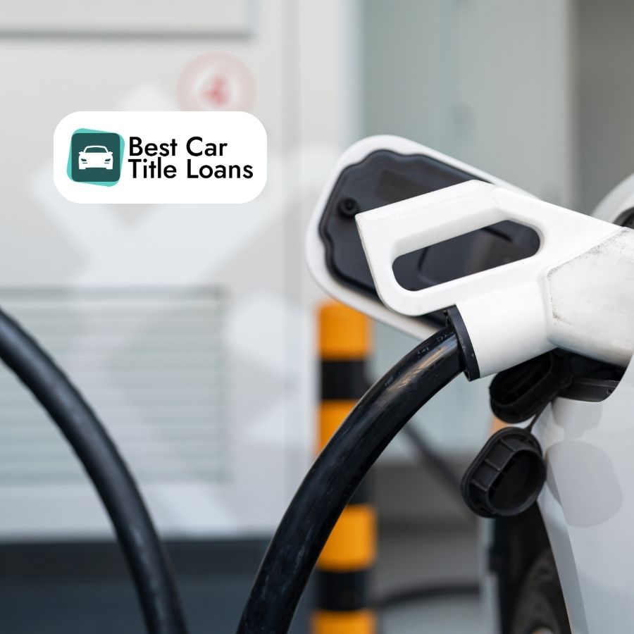 An EV driver checking a charging app on their phone, addressing EV range anxiety